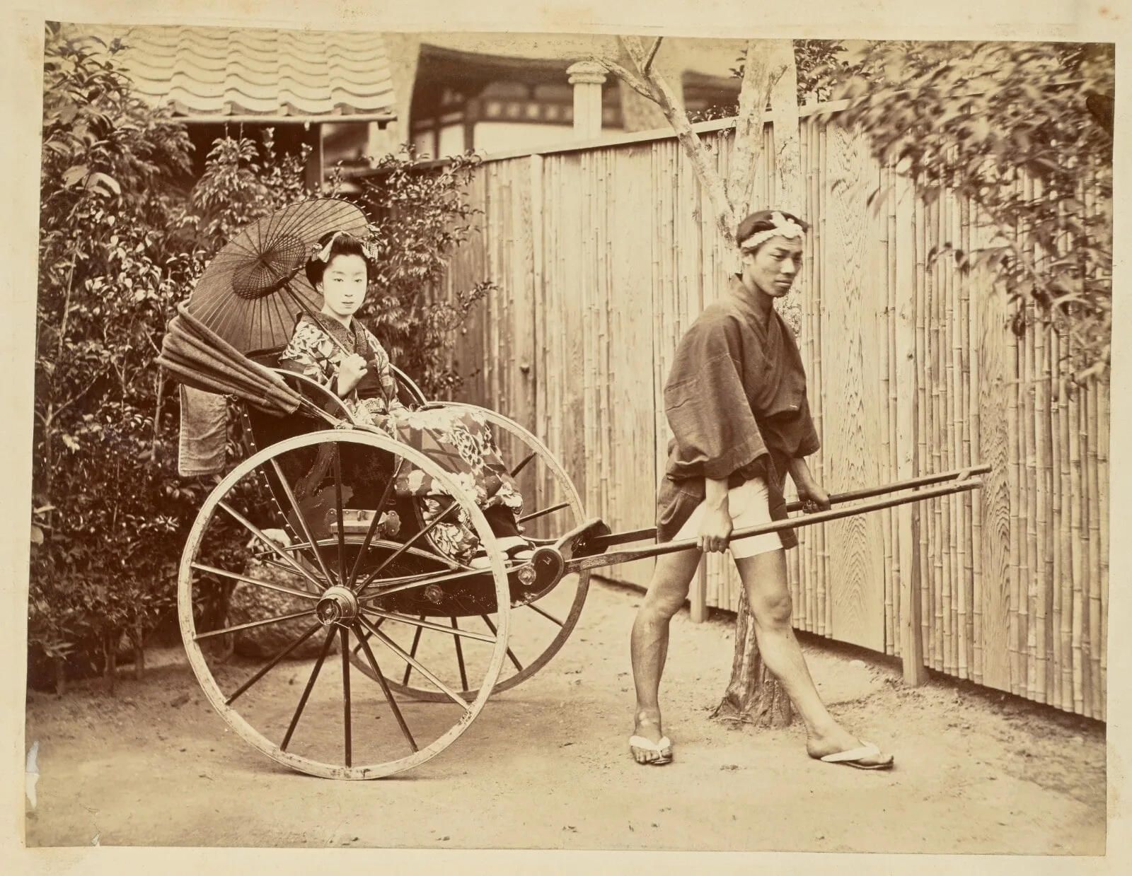 [Japanese woman in a rickshaw]